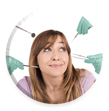 nervous looking woman surrounded by dental tools