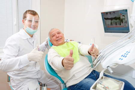 elderly man with dentist