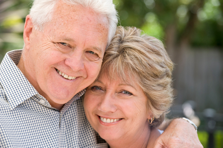 elderly couple smiling