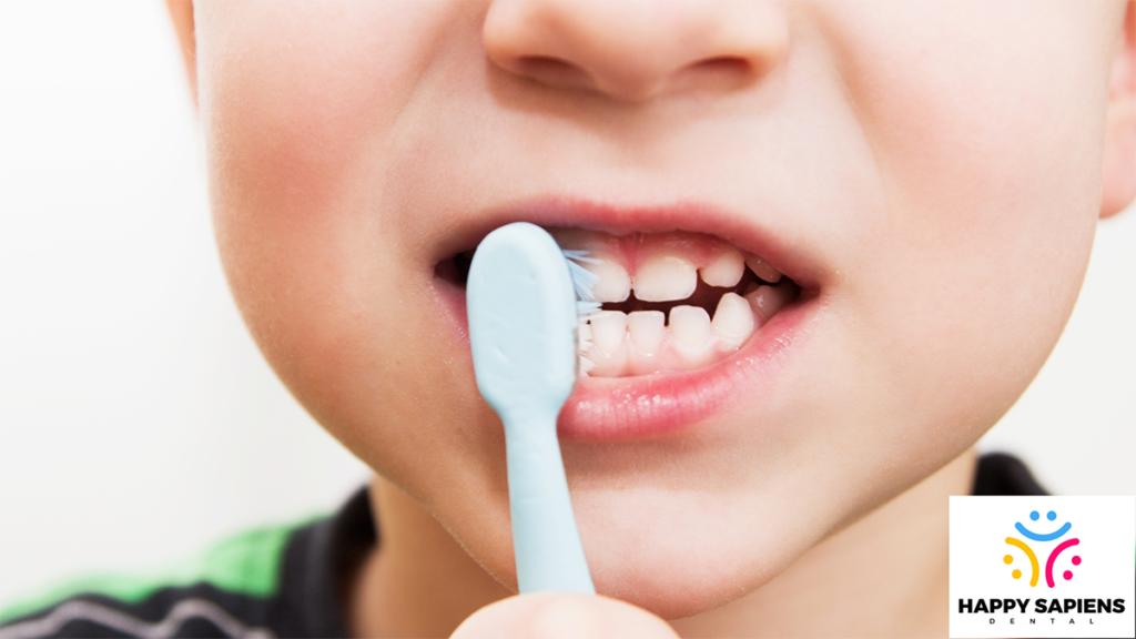 A child brushing his teeth.